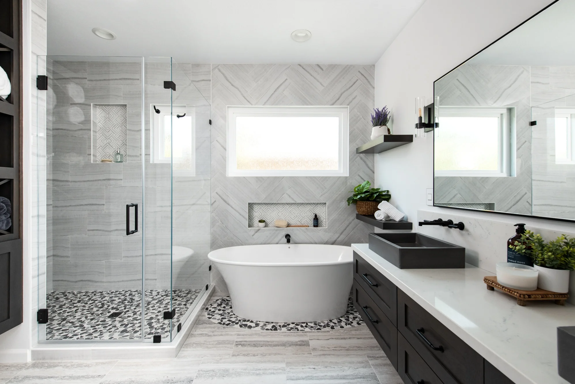 Master bathroom remodel with herringbone pattern wall tile